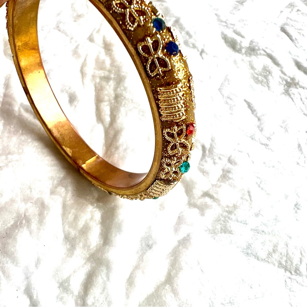 Elegant Gold tone Bangle with Multicolor rhinestone Accents